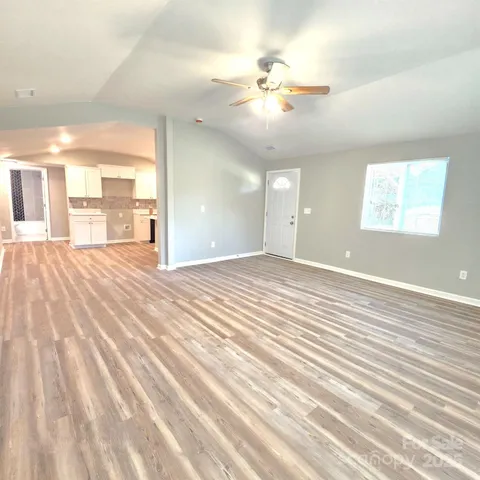 a view of a livingroom with a ceiling fan