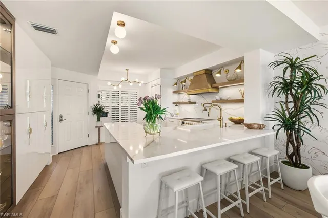 $1,199,000 | 601 La Peninsula Boulevard, Unit 601, Naples, FL 34113