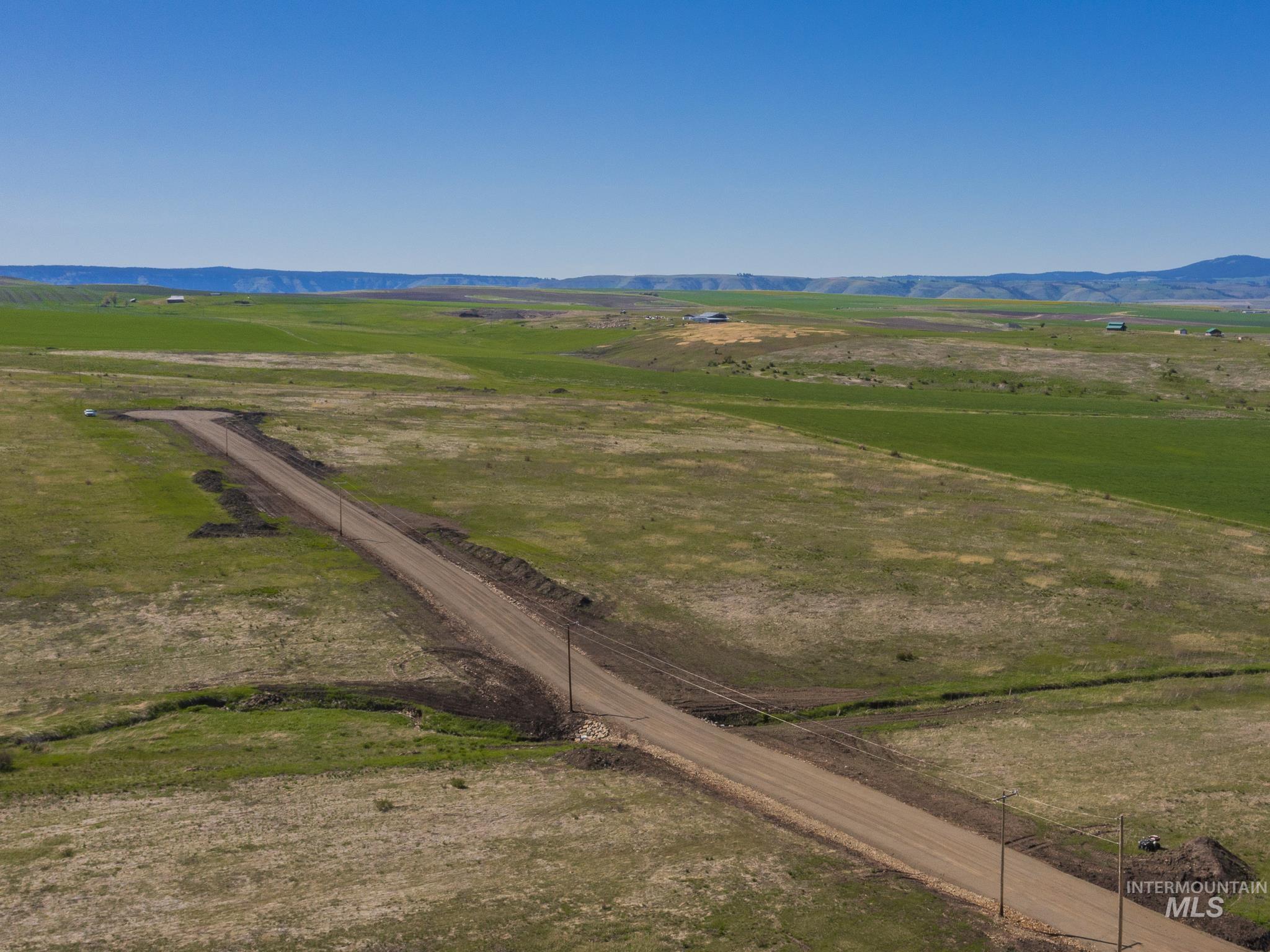 3 Freebird Way Grangeville, ID 83530 - Photo 9 of 43 View of rural area featuring a mountainous background