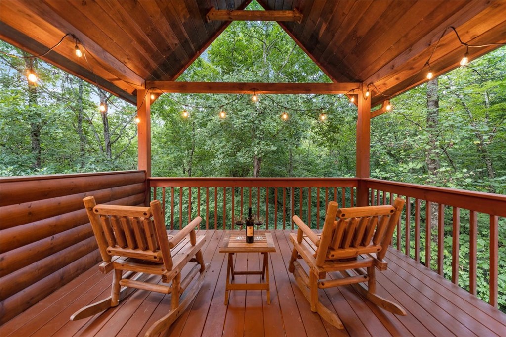 126 Brookwood Drive Blue Ridge, GA 30513 - Photo 64 of 106 a view of a chair and table on the deck