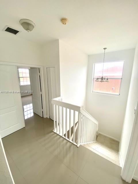 15368 Southwest 25th Terrace Miami, FL 33185 - Photo 13 of 30 a view of a hallway with windows