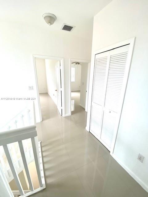 15368 Southwest 25th Terrace Miami, FL 33185 - Photo 14 of 30 a view of an empty room and a window