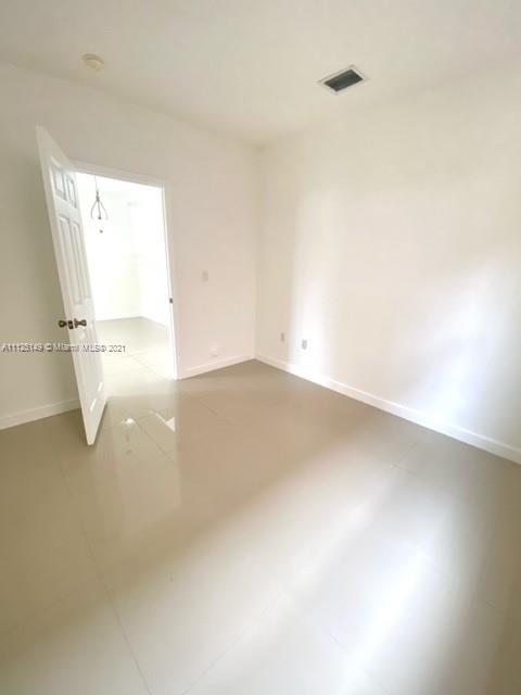 15368 Southwest 25th Terrace Miami, FL 33185 - Photo 16 of 30 an empty room with a window