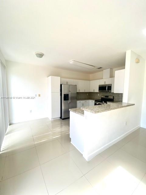 15368 Southwest 25th Terrace Miami, FL 33185 - Photo 5 of 30 a view of kitchen with appliances and cabinets