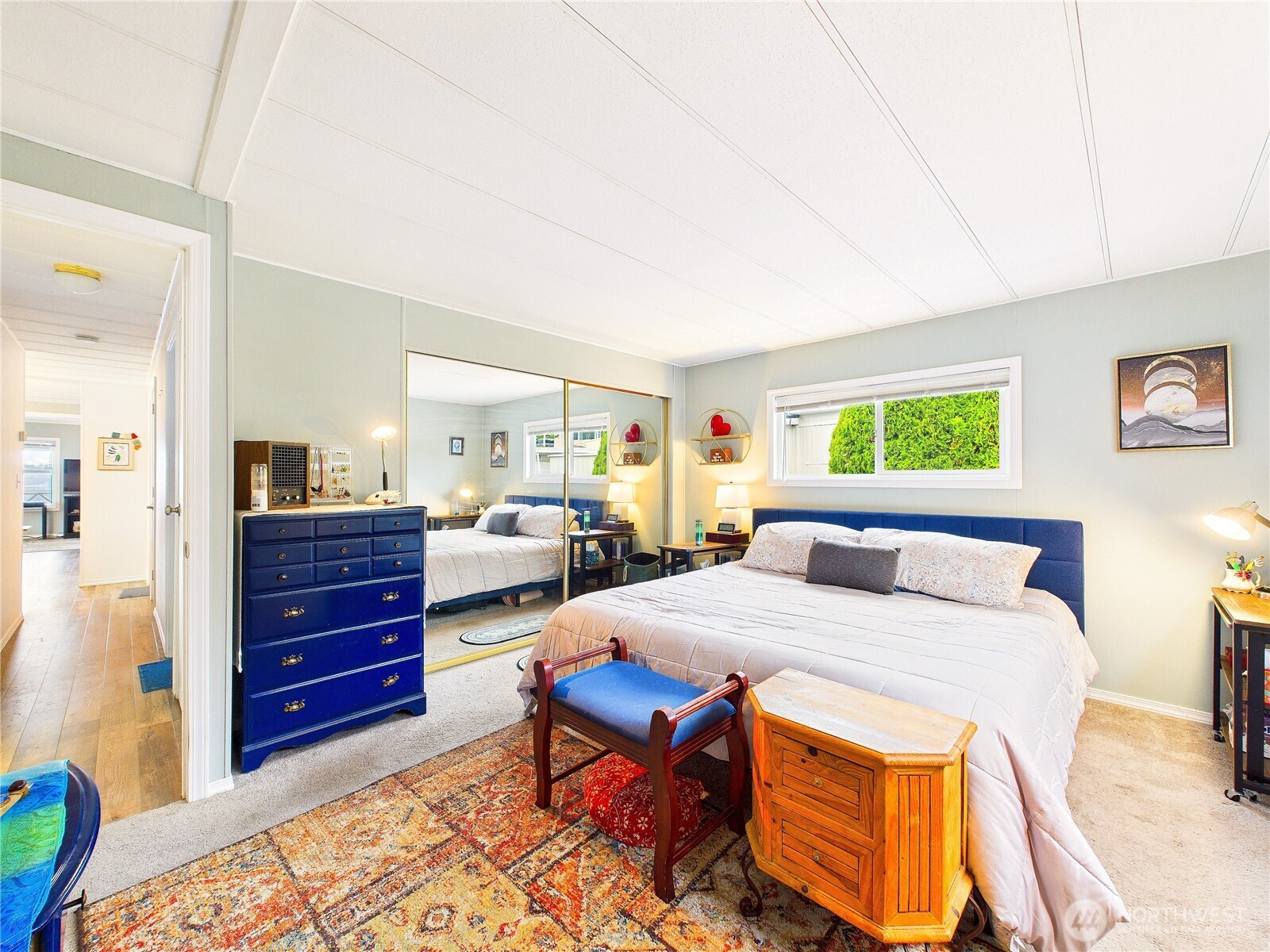 4805 Cushman Road Northeast, Unit 56 Olympia, WA 98506 - Photo 24 of 30 a bed room with a bed and a dresser