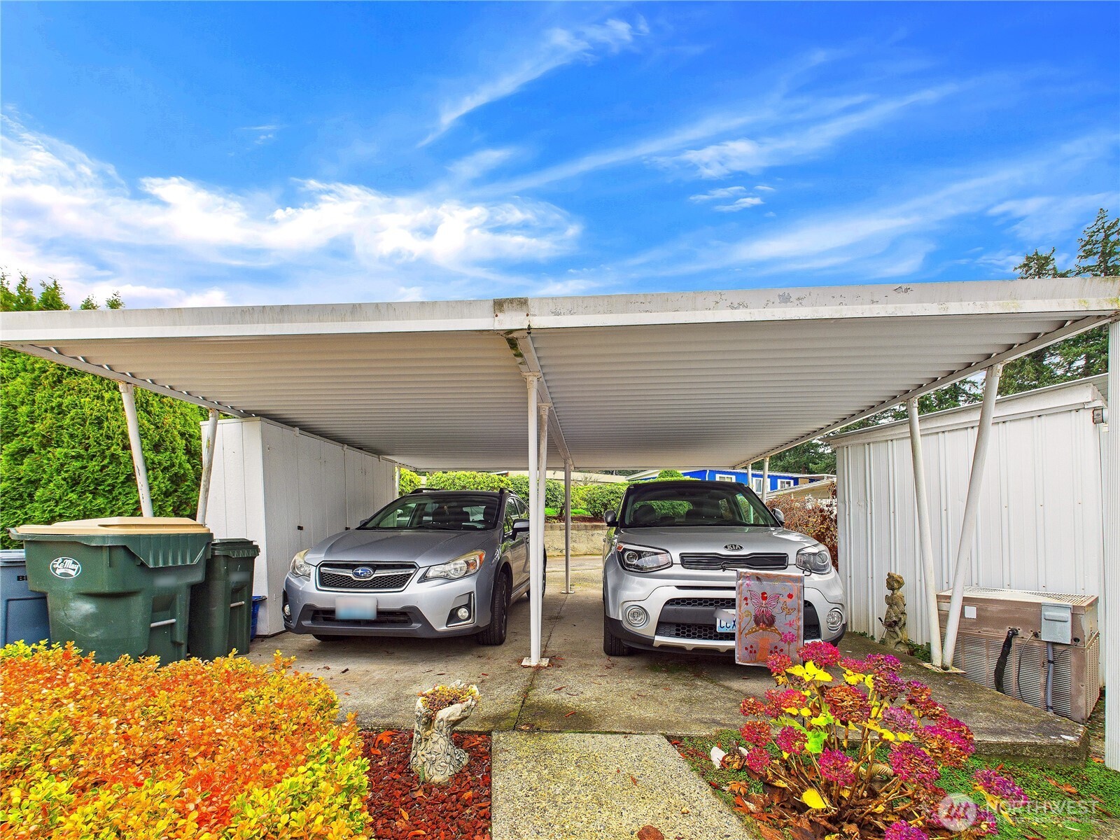 4805 Cushman Road Northeast, Unit 56 Olympia, WA 98506 - Photo 27 of 30 a view of a patio with table and chairs and potted plants