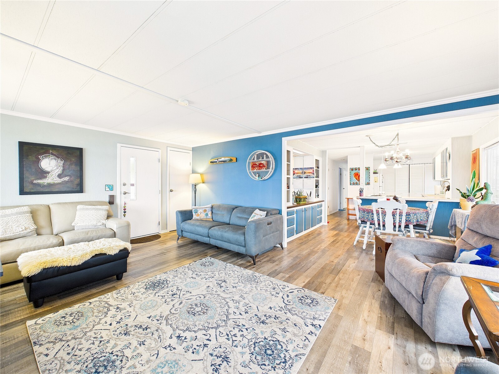 4805 Cushman Road Northeast, Unit 56 Olympia, WA 98506 - Photo 8 of 30 a living room with furniture and a rug