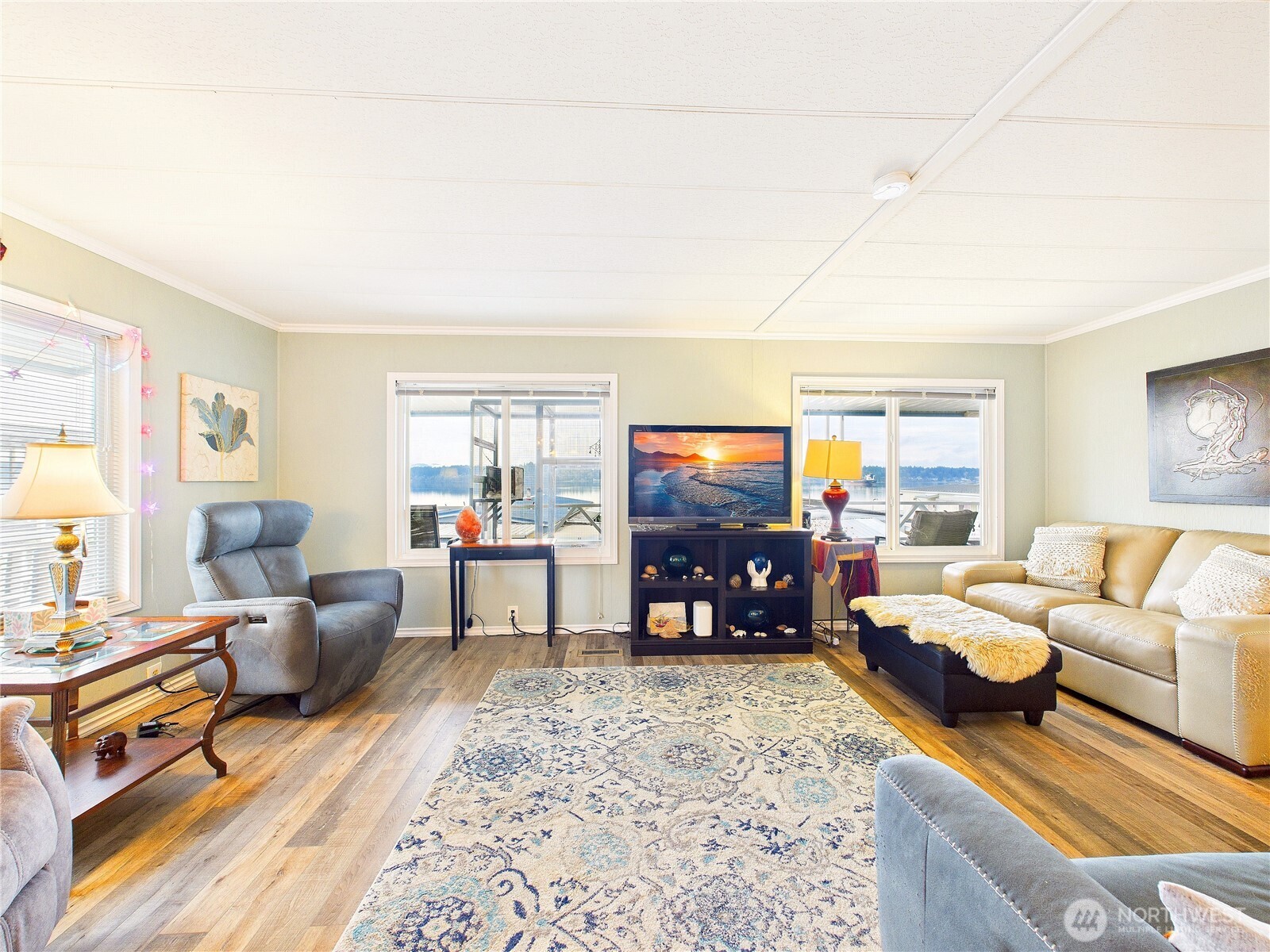 4805 Cushman Road Northeast, Unit 56 Olympia, WA 98506 - Photo 9 of 30 a living room with furniture and a flat screen tv