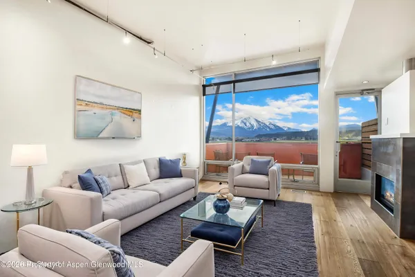 front view of a building with a garden