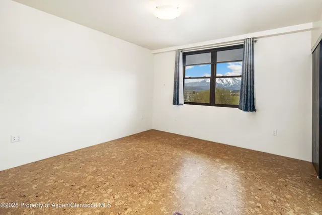 an empty room with window
