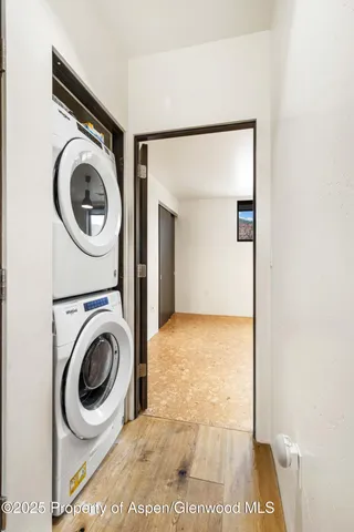 a view of a storage & utility room with washer and dryer