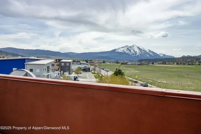 a view of a lake with a mountain in the background