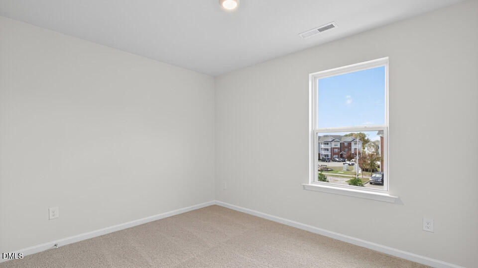 3604 Turney Drive Raleigh, NC 27610 - Photo 20 of 39 an empty room with a window