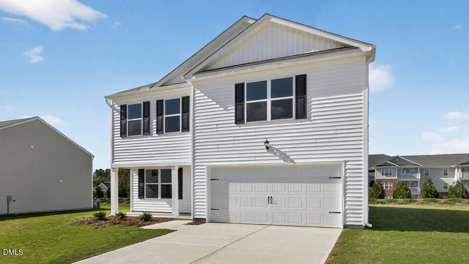 3604 Turney Drive Raleigh, NC 27610 - Photo 2 of 39 a view of a house with a yard