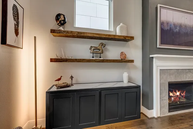 a kitchen with a stove and cabinets
