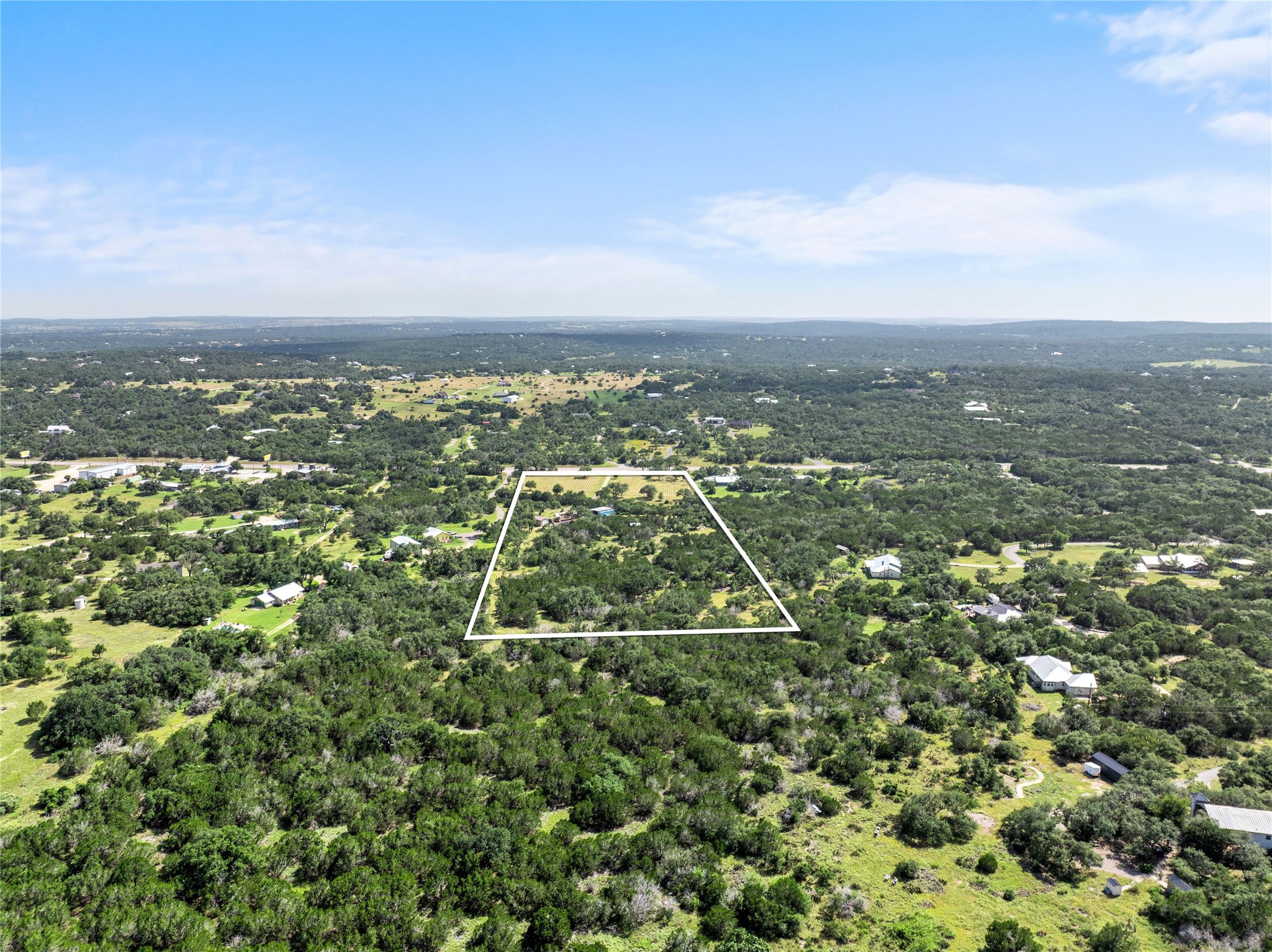 8200 Ranch Road 12 San Marcos, TX 78666 - Photo 33 of 40 Secure a vast, tree-dotted land parcel, an exceptional opportunity for your dream estate.