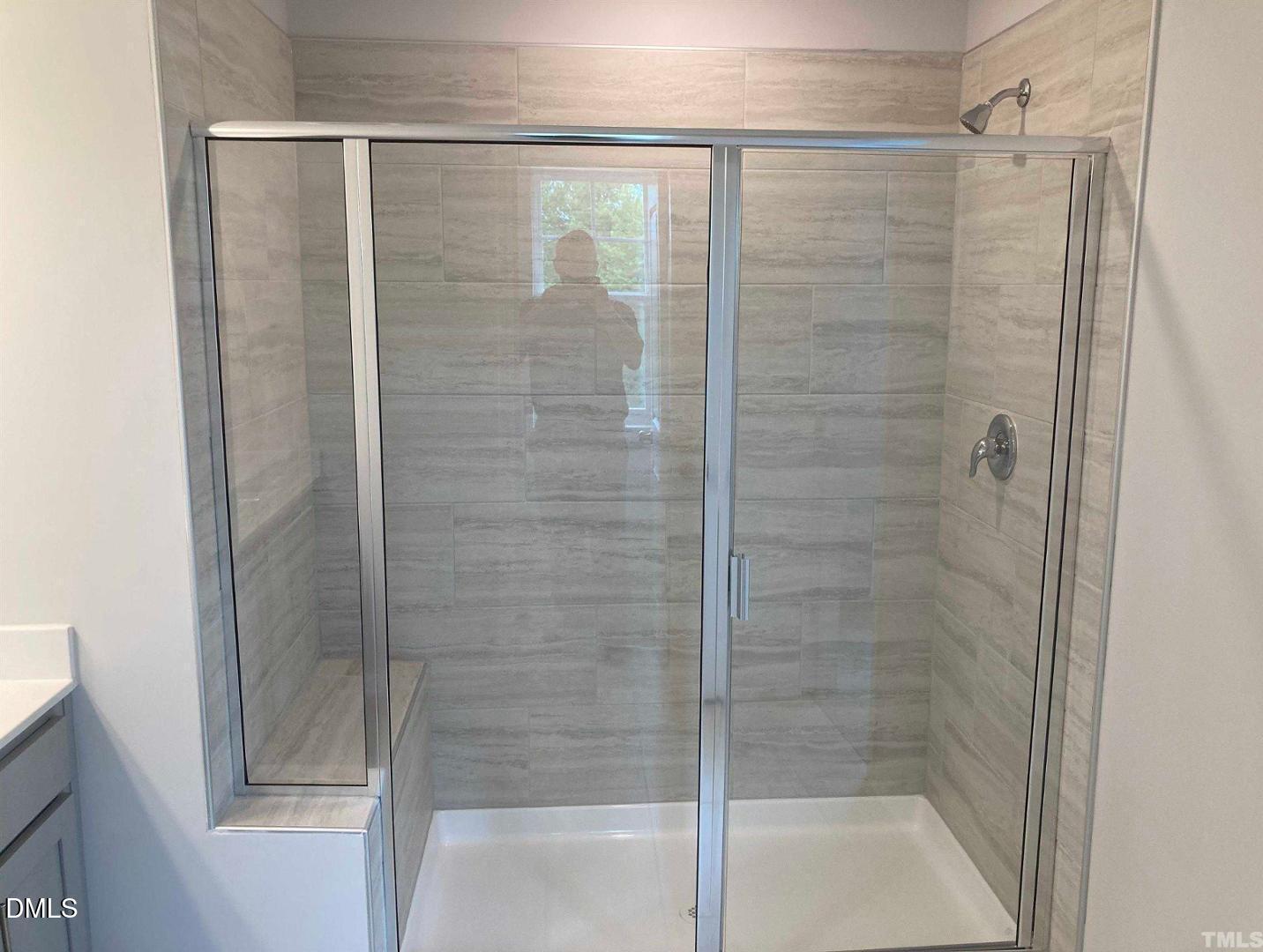 1823 Caen Street Raleigh, NC 27610 - Photo 5 of 13 a bathroom with a shower