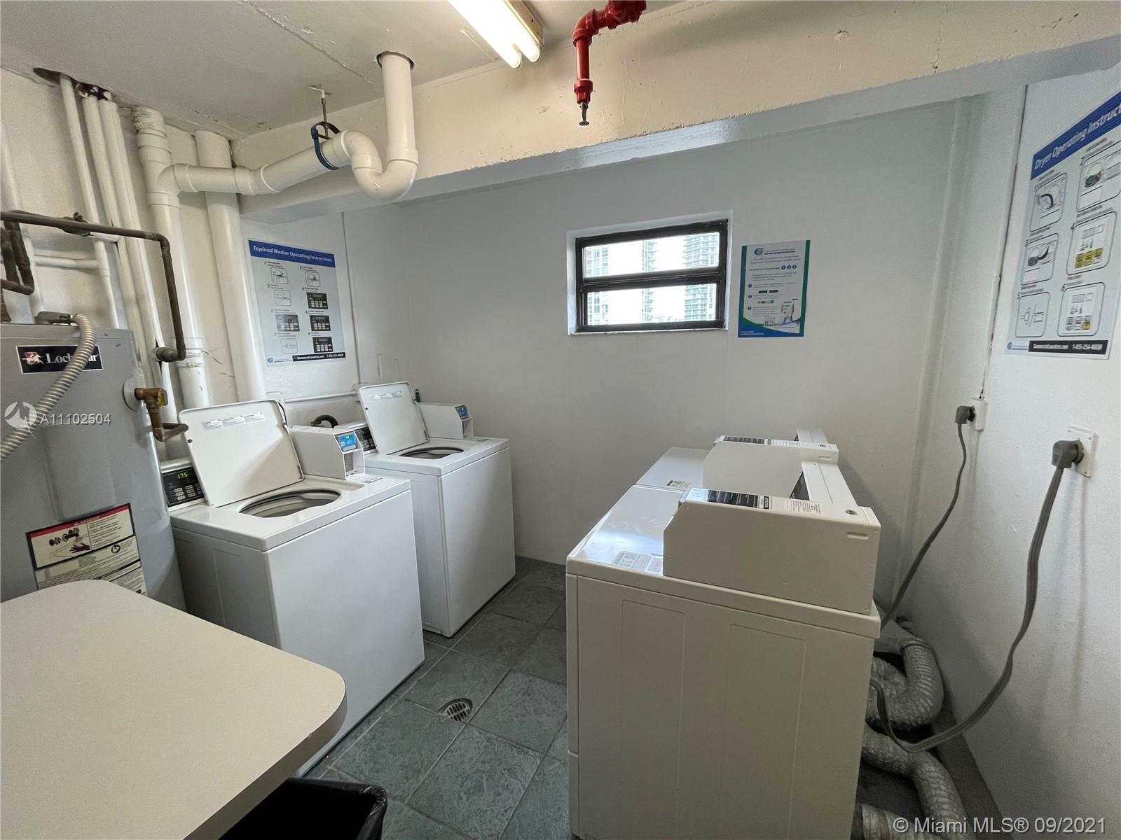 16909 North Bay Road, Unit 807 Sunny Isles Beach, FL 33160 - Photo 14 of 17 a utility room with dryer and washer