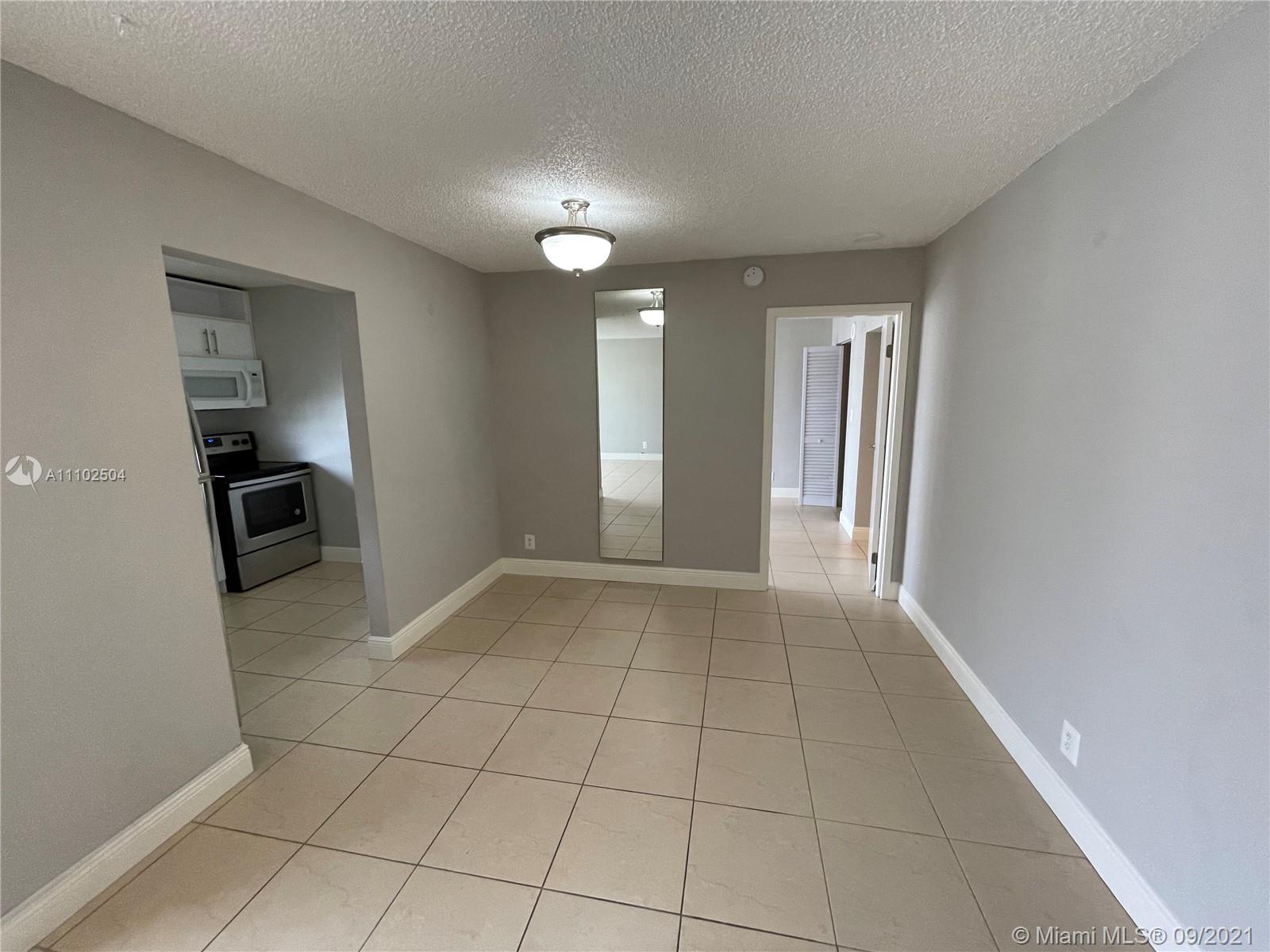 16909 North Bay Road, Unit 807 Sunny Isles Beach, FL 33160 - Photo 5 of 17 a view of an empty room and a sink