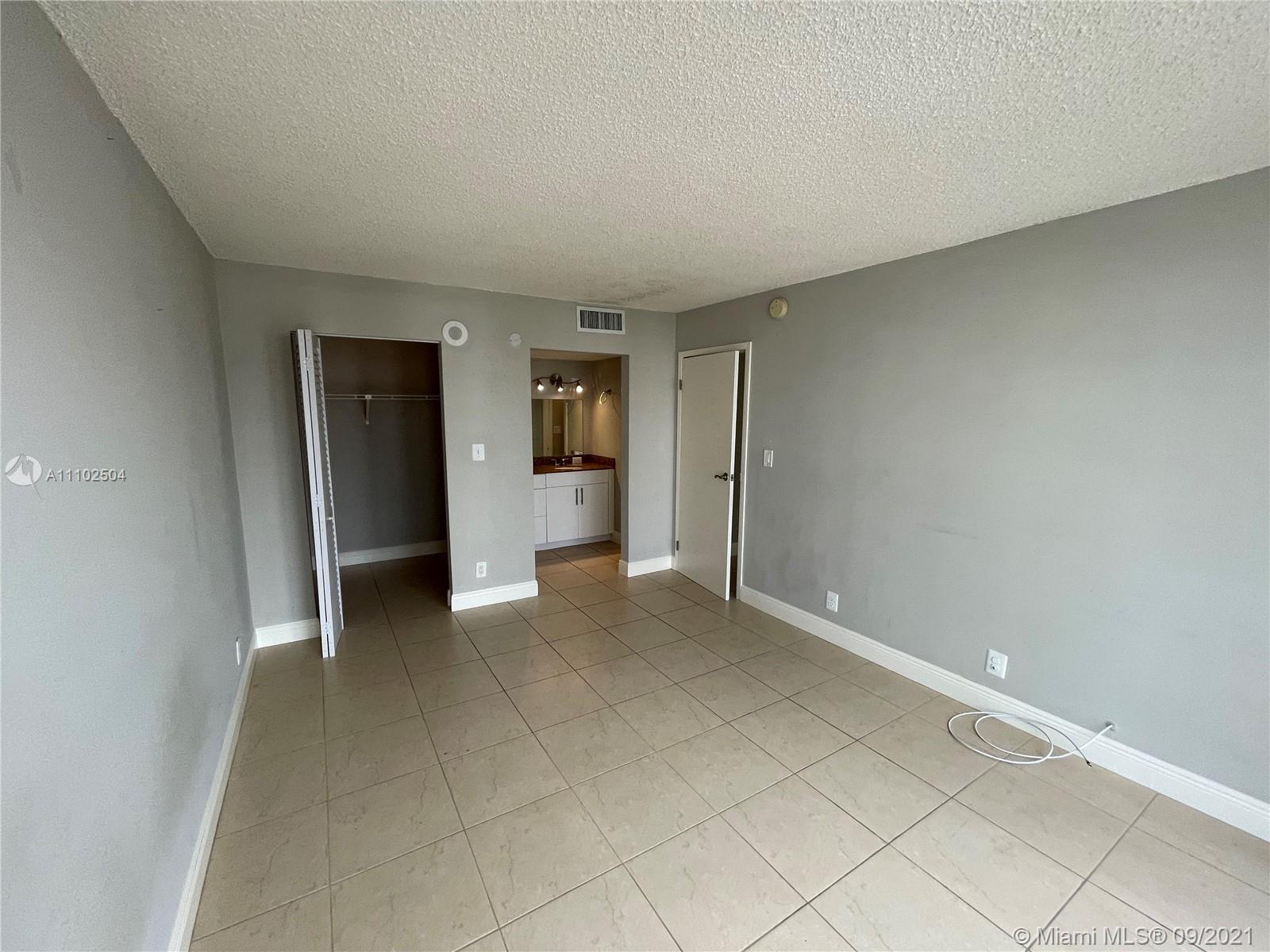 16909 North Bay Road, Unit 807 Sunny Isles Beach, FL 33160 - Photo 8 of 17 a view of an empty room and a window