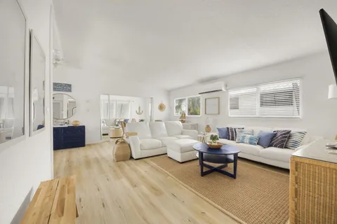 a living room with furniture and a couch