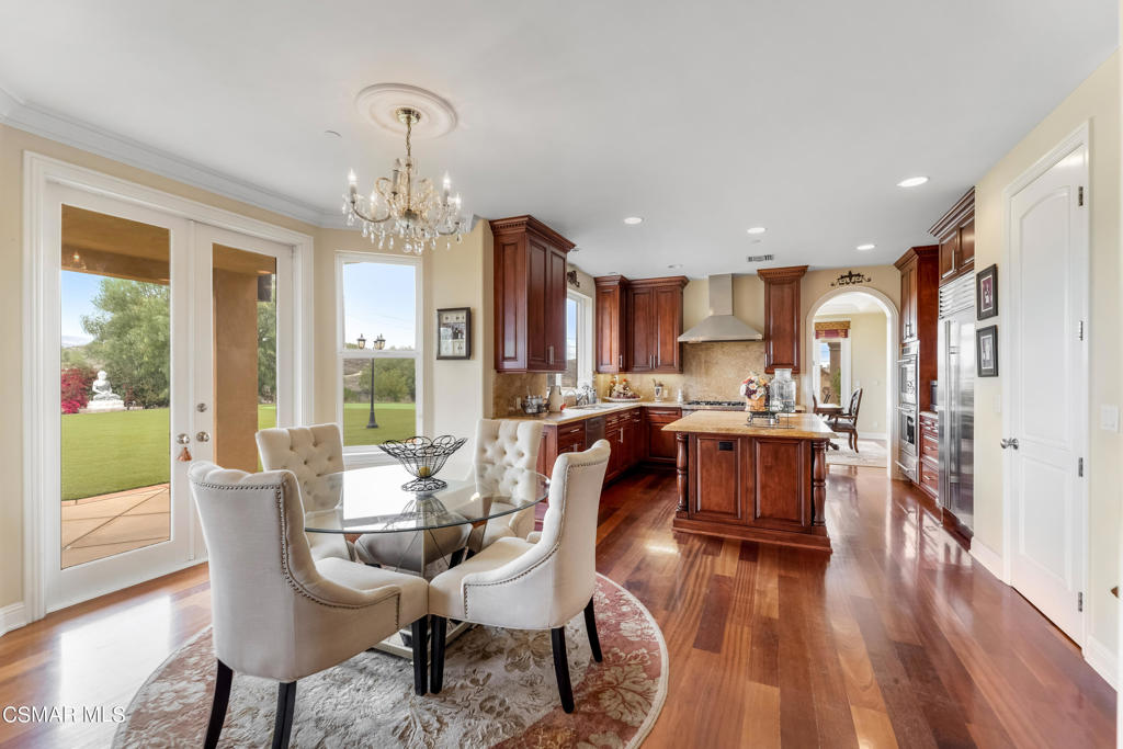 6717 Aspen Hills Drive Moorpark, CA 93021 - Photo 11 of 44 a view of a dining room with furniture window and wooden floor