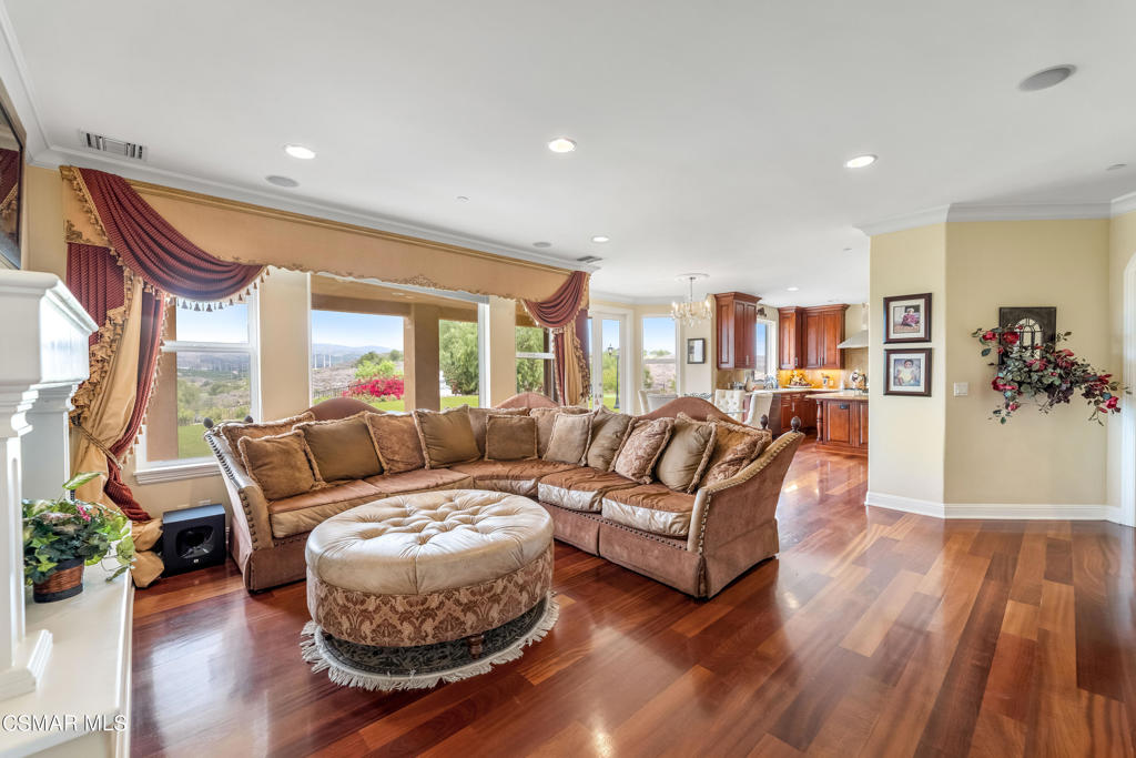6717 Aspen Hills Drive Moorpark, CA 93021 - Photo 15 of 44 a living room with furniture and a wooden floor