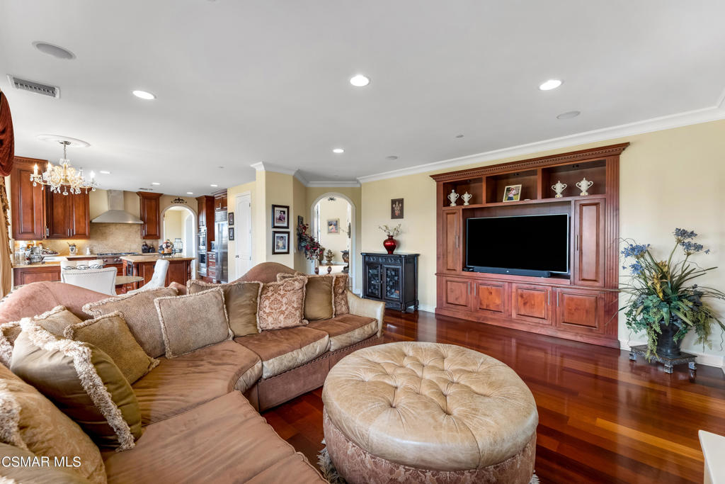 6717 Aspen Hills Drive Moorpark, CA 93021 - Photo 16 of 44 a living room with furniture and a flat screen tv