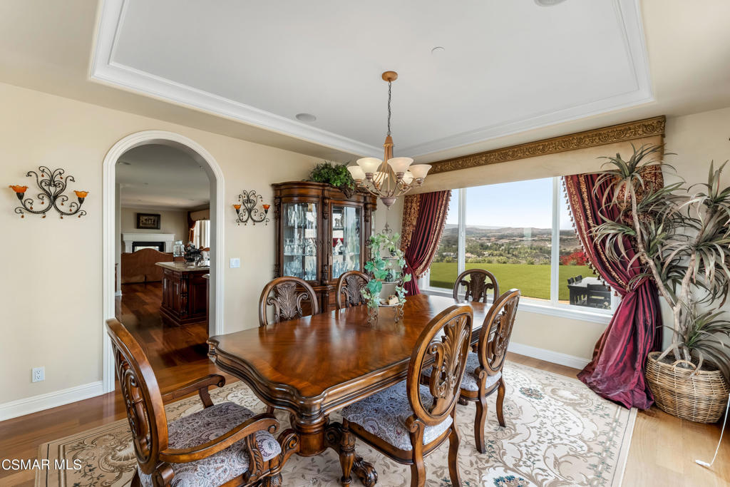 6717 Aspen Hills Drive Moorpark, CA 93021 - Photo 18 of 44 a dining room with furniture window and wooden floor