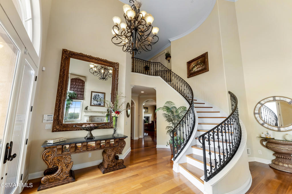 6717 Aspen Hills Drive Moorpark, CA 93021 - Photo 22 of 44 a view of an entryway with wooden floor and windows