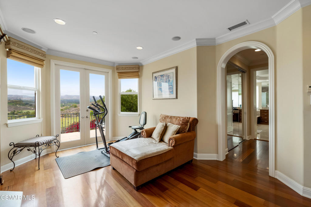 6717 Aspen Hills Drive Moorpark, CA 93021 - Photo 24 of 44 a living room with furniture and wooden floor