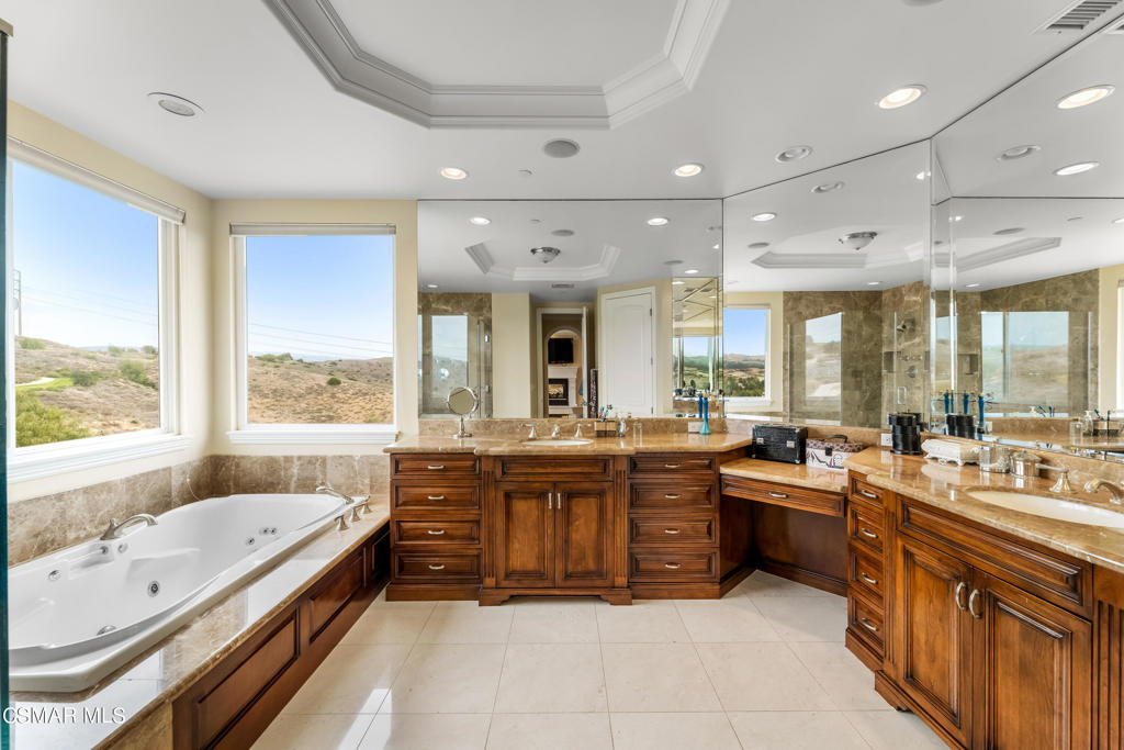 6717 Aspen Hills Drive Moorpark, CA 93021 - Photo 25 of 44 a large kitchen with a large window and stainless steel appliances