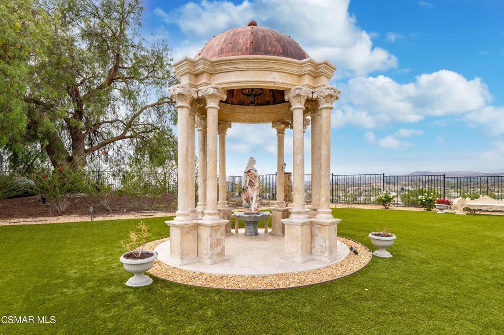 6717 Aspen Hills Drive Moorpark, CA 93021 - Photo 42 of 44 a front view of a house with a yard