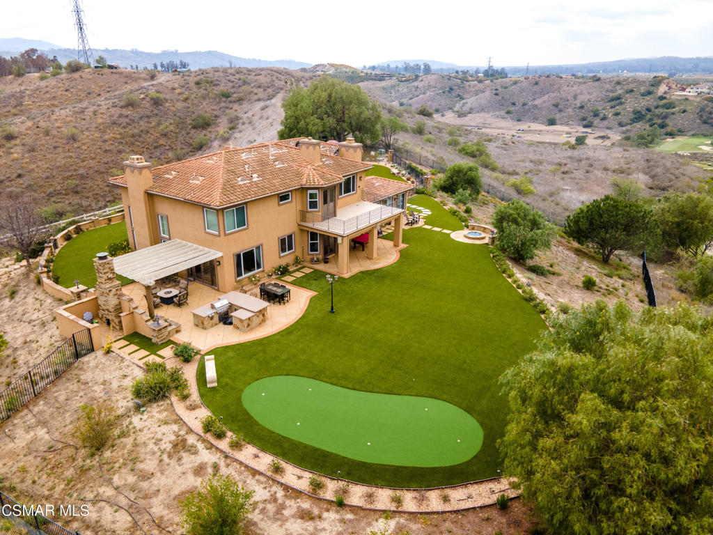 6717 Aspen Hills Drive Moorpark, CA 93021 - Photo 43 of 44 an aerial view of residential house with outdoor space and trees all around