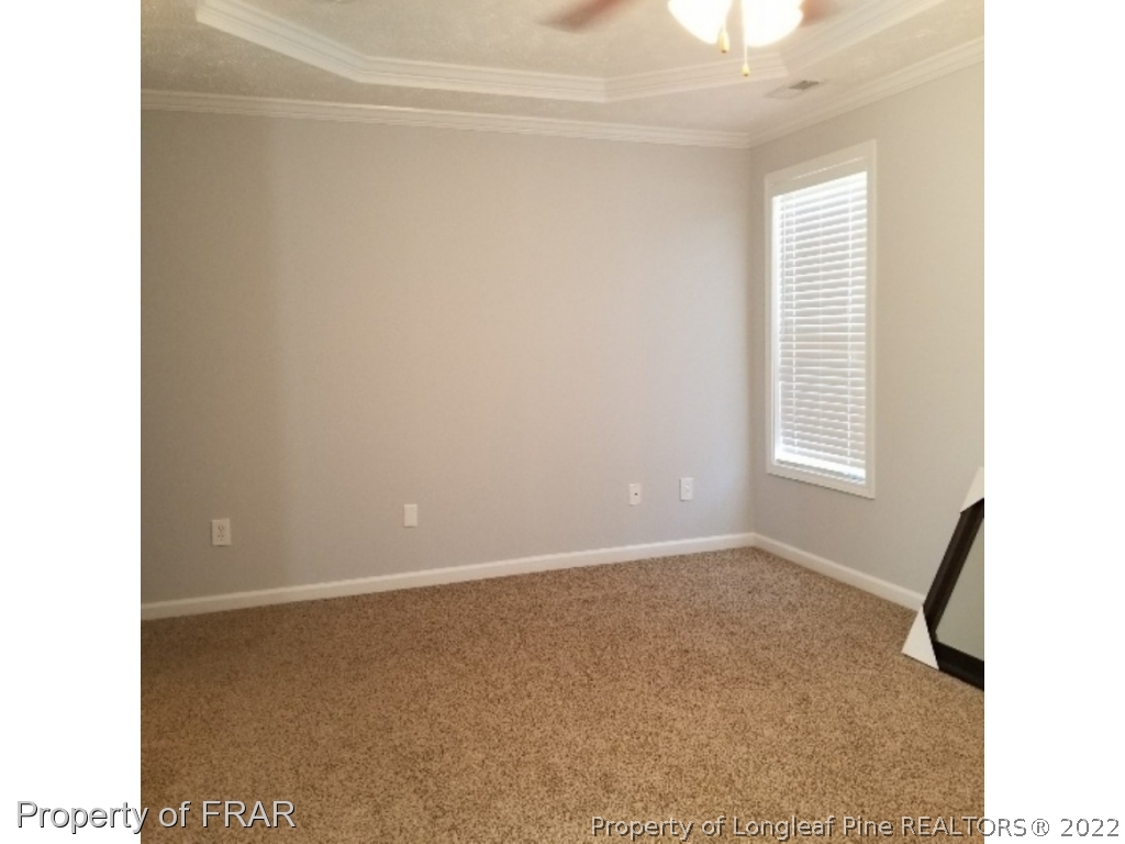 2309 Chasewater Road Fayetteville, NC 28306 - Photo 11 of 31 a view of an empty room with a window