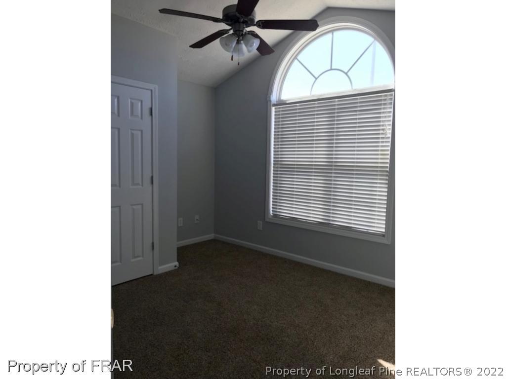 2309 Chasewater Road Fayetteville, NC 28306 - Photo 15 of 31 a view of empty room with windows
