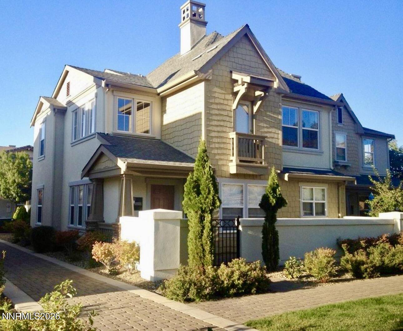 7616 Stone Bluff Way Reno, NV 89523 - Photo 1 of 18 front view of a house with a small yard