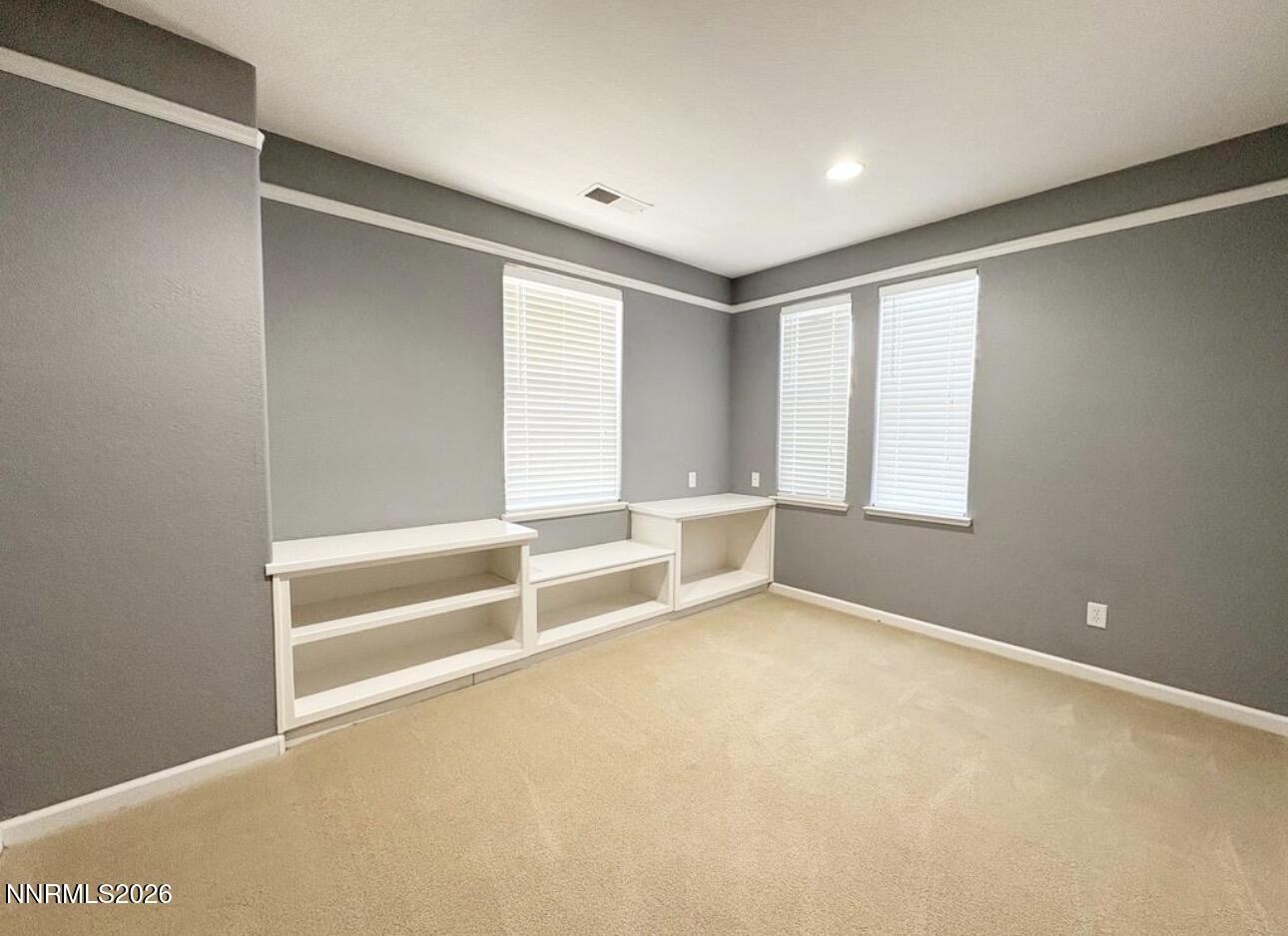 7616 Stone Bluff Way Reno, NV 89523 - Photo 12 of 18 a view of an empty room with a window