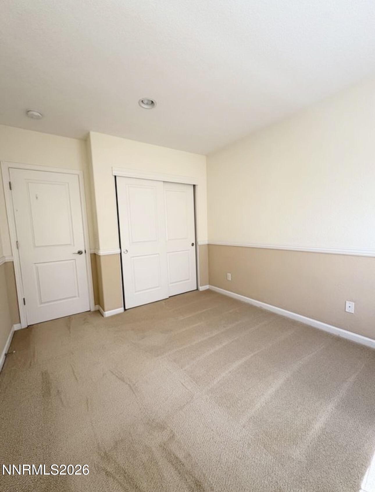 7616 Stone Bluff Way Reno, NV 89523 - Photo 15 of 18 an empty room with an empty space
