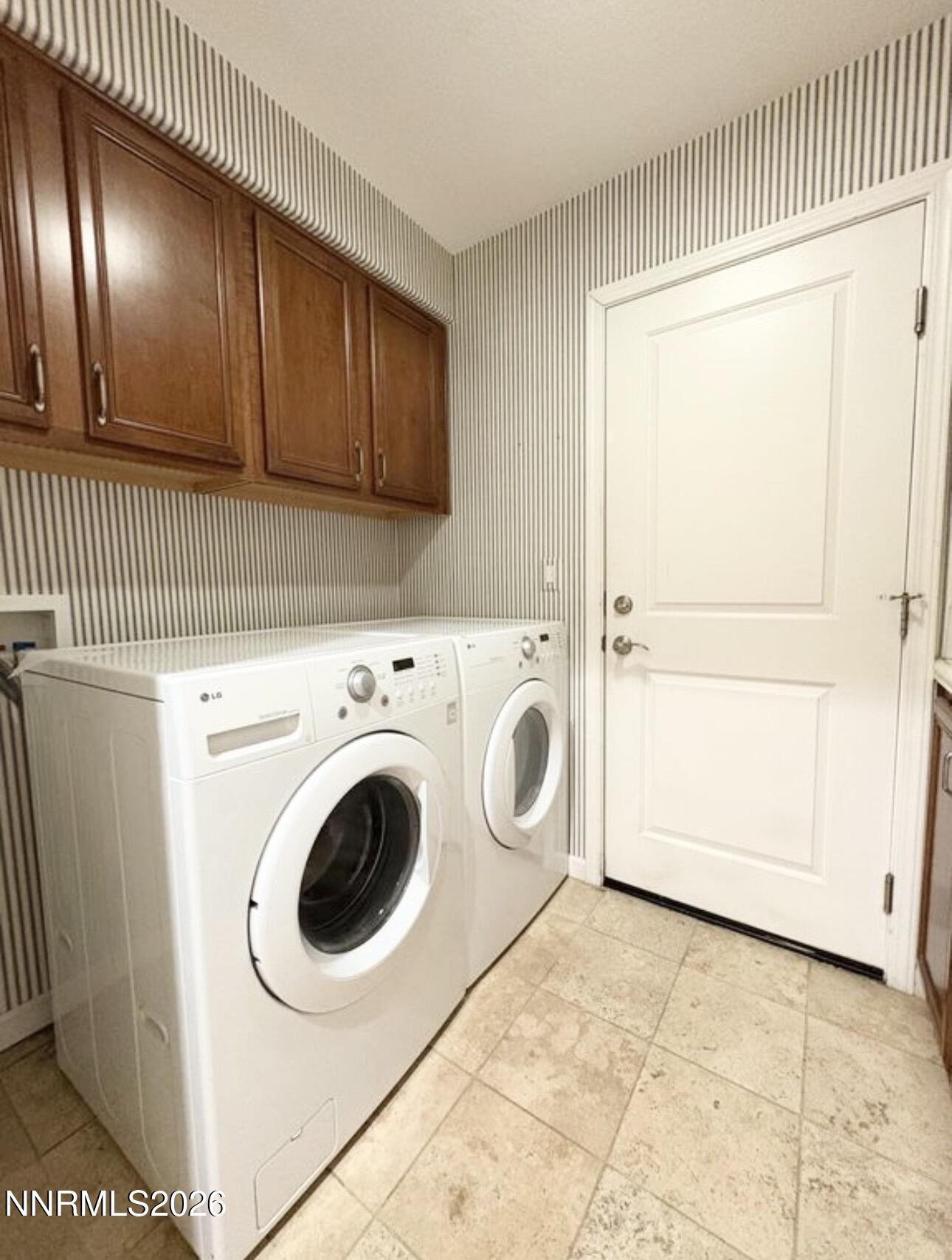 7616 Stone Bluff Way Reno, NV 89523 - Photo 17 of 18 a utility room with dryer and washer