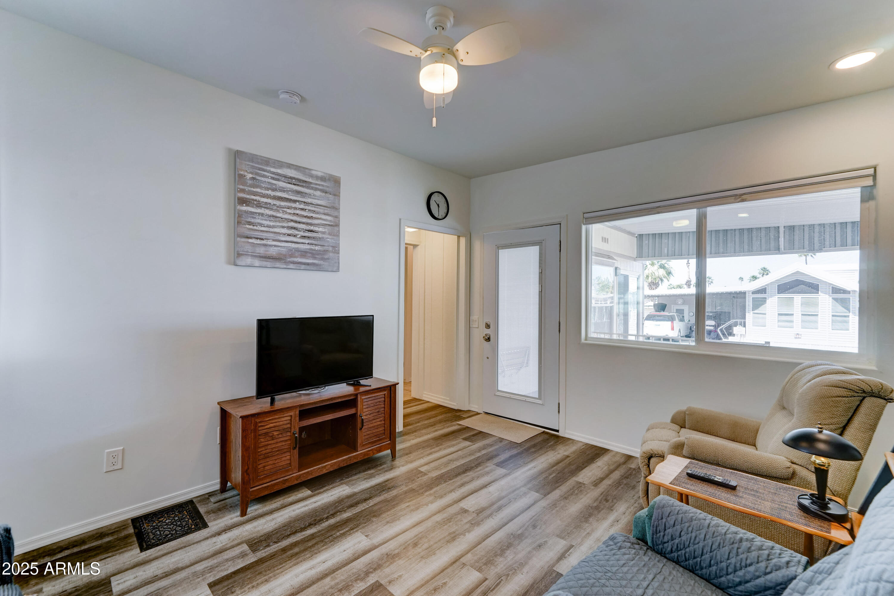 111 South Greenfield Road, Unit 244 Mesa, AZ 85206 - Photo 7 of 29 Inside the window blinds on front door