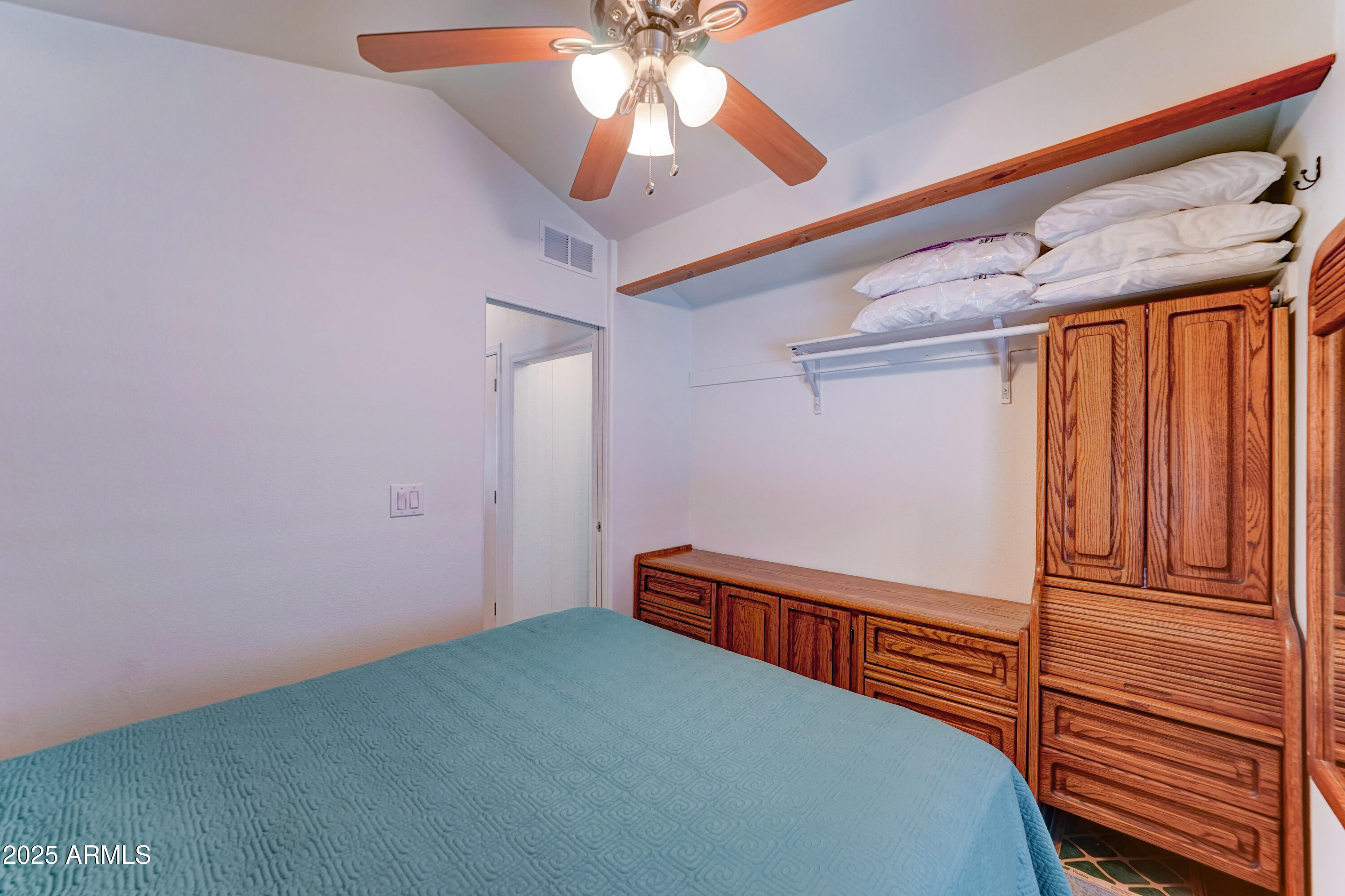 111 South Greenfield Road, Unit 244 Mesa, AZ 85206 - Photo 9 of 29 Armoire and dresser in bedroom