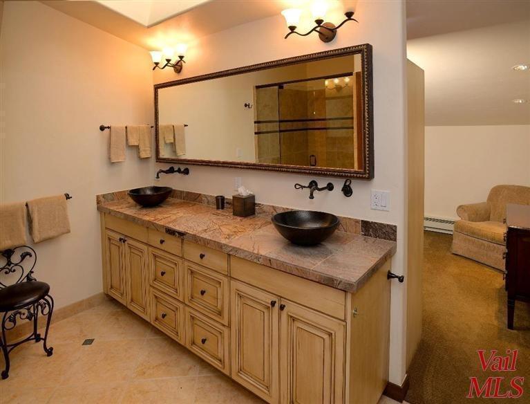 950 Red Sandstone Road, Unit 26 Vail, CO 81657 - Photo 15 of 23 Spacious master bathroom with adjoining