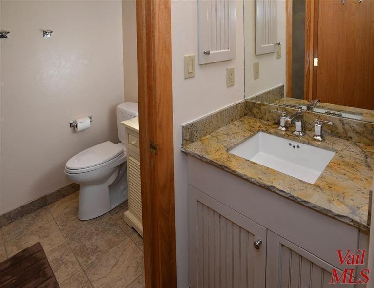 950 Red Sandstone Road, Unit 26 Vail, CO 81657 - Photo 19 of 23 Renovated bathrooms off both guest rooms