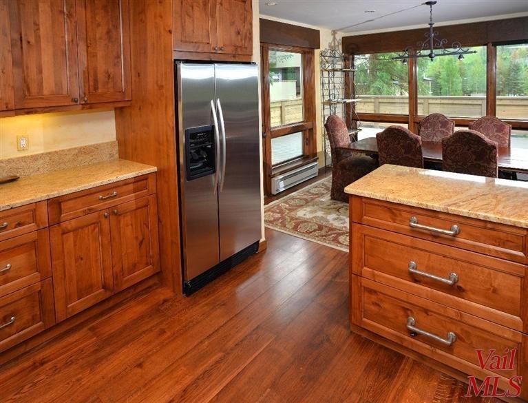 950 Red Sandstone Road, Unit 26 Vail, CO 81657 - Photo 8 of 23 Kitchen opens into dining room.