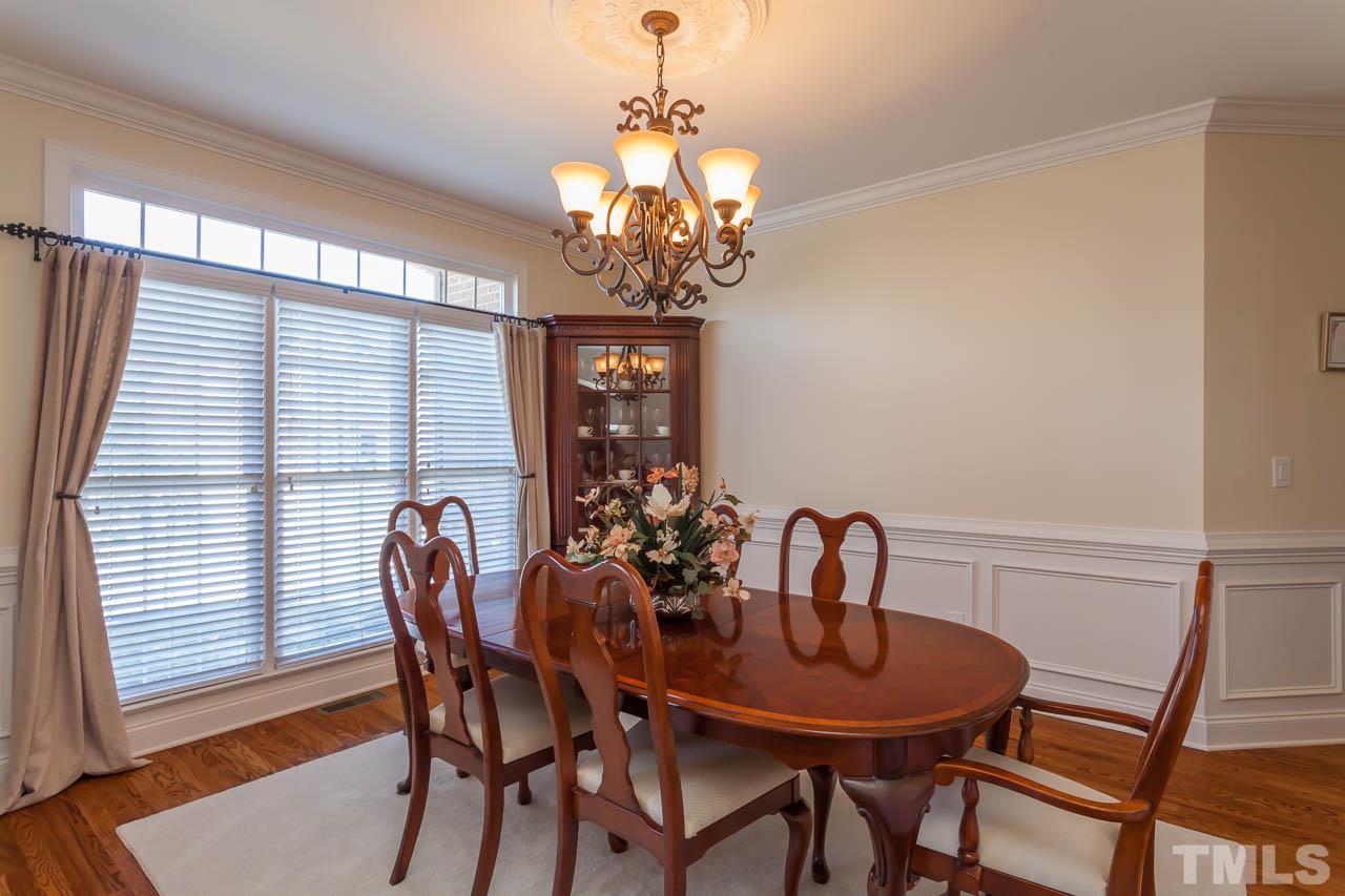 11825 Lowery Ridge Drive Raleigh, NC 27614 - Photo 3 of 25 a view of a dining room with furniture and window
