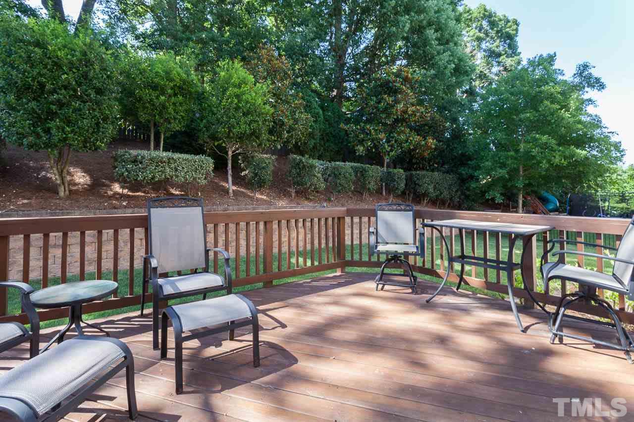 11825 Lowery Ridge Drive Raleigh, NC 27614 - Photo 25 of 25 a view of a chairs and table in the patio