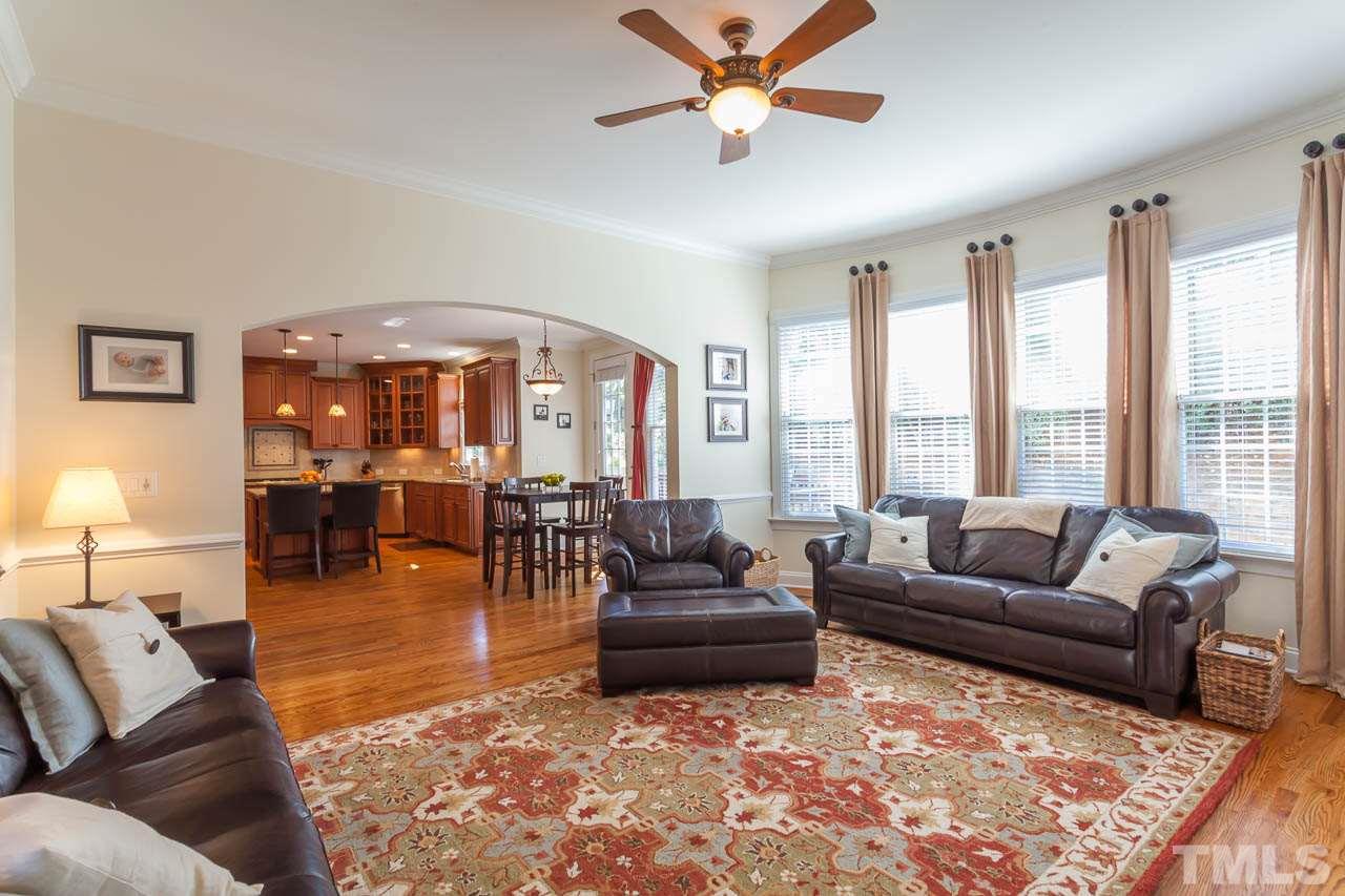 11825 Lowery Ridge Drive Raleigh, NC 27614 - Photo 6 of 25 a living room with furniture and a large window