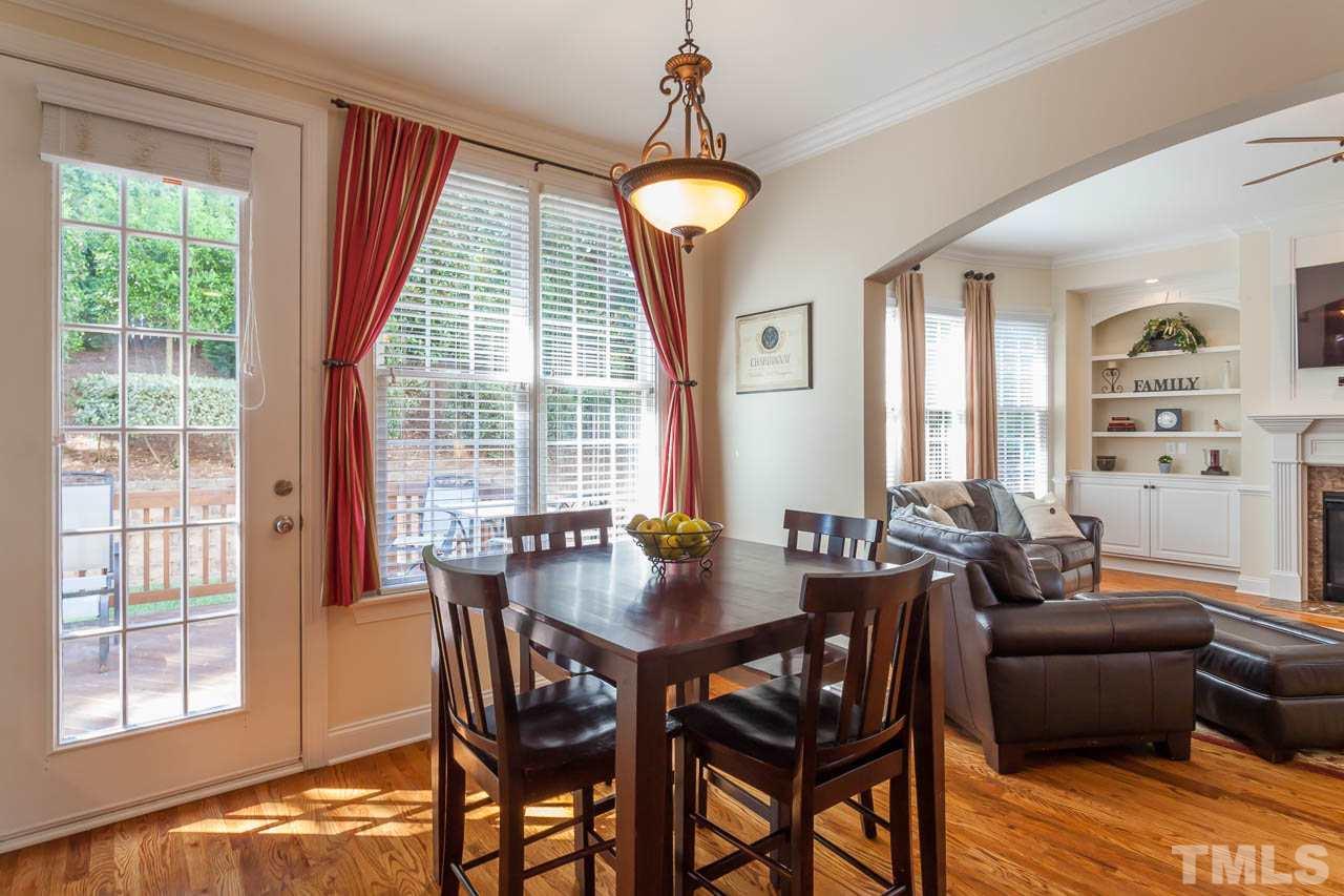 11825 Lowery Ridge Drive Raleigh, NC 27614 - Photo 10 of 25 a view of a dining room with furniture window and outside view