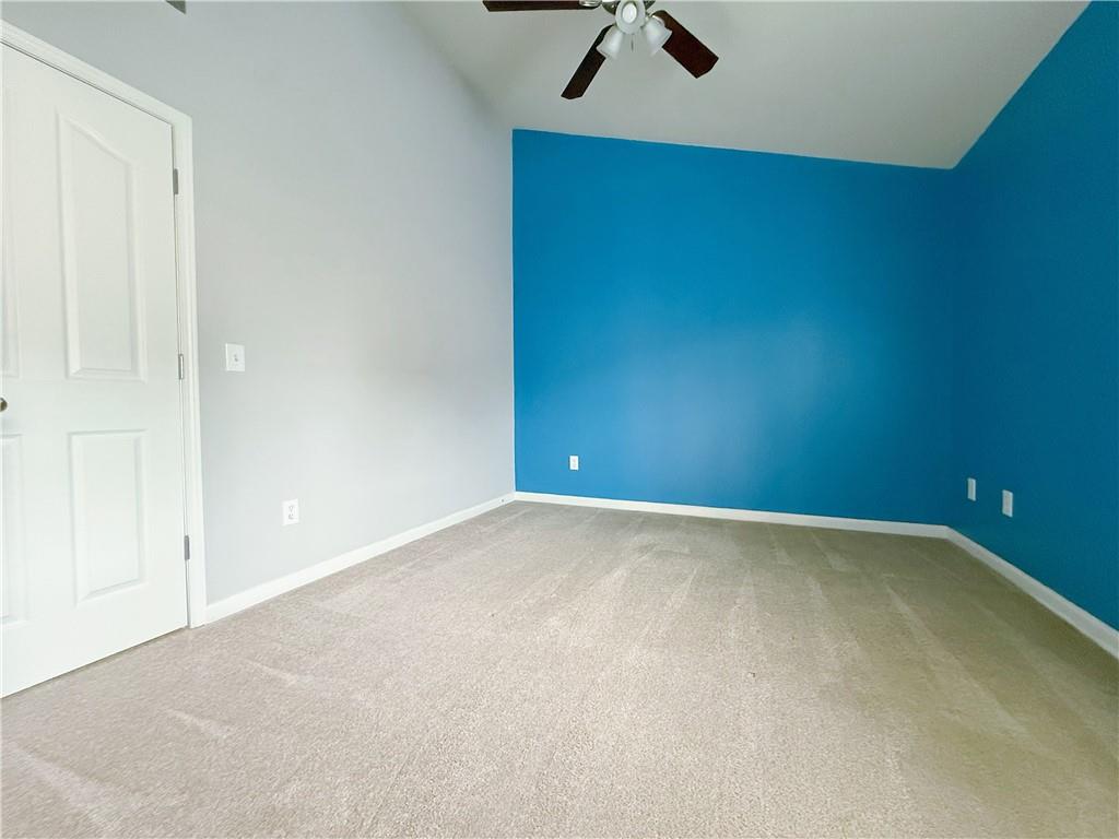 5691 Apple Grove Road Northeast Buford, GA 30519 - Photo 12 of 23 an empty room